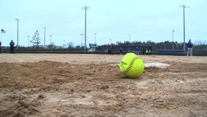 Softball on Ground by Home Plate
