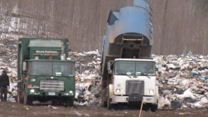 Garbage Trucks in Landfill