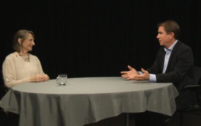 Mary Marana (Left) discusses the crisis line service with host Jason Edans (Right)